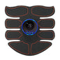 Black and red muscle stimulator device with digital display on a white background
