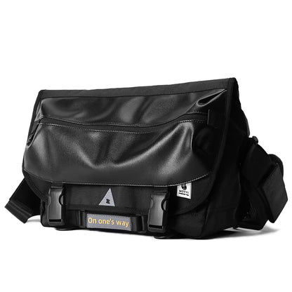 Black leather bag with visible branding on a white background