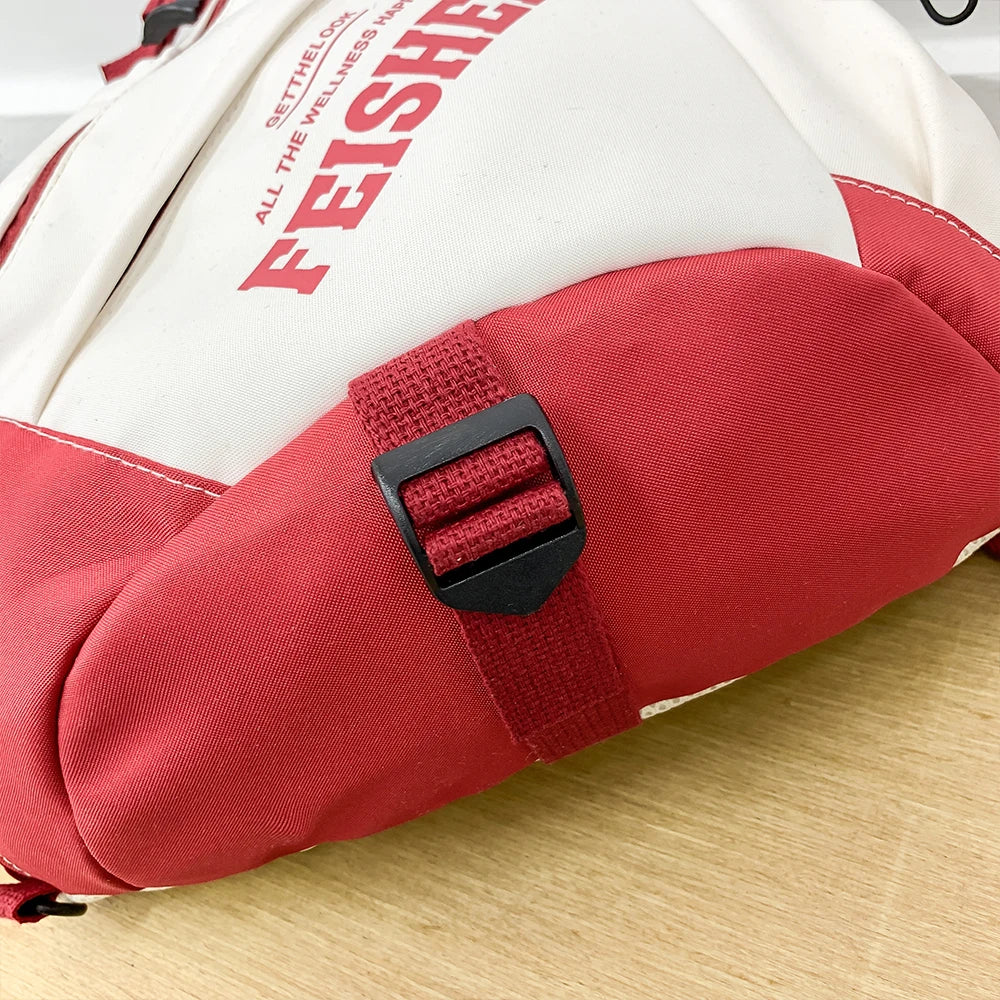 Red and white bag with a visible brand name on a wooden surface