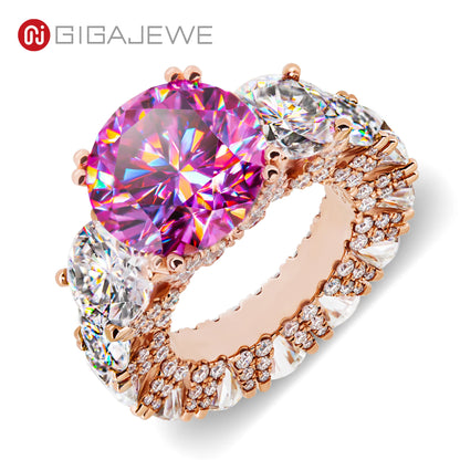Elegant ring with pink gemstone and rose gold band on a white background, featuring the brand 'GIGAJEWE'.