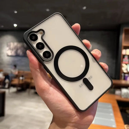 Hand holding a phone case with a blurred indoor background