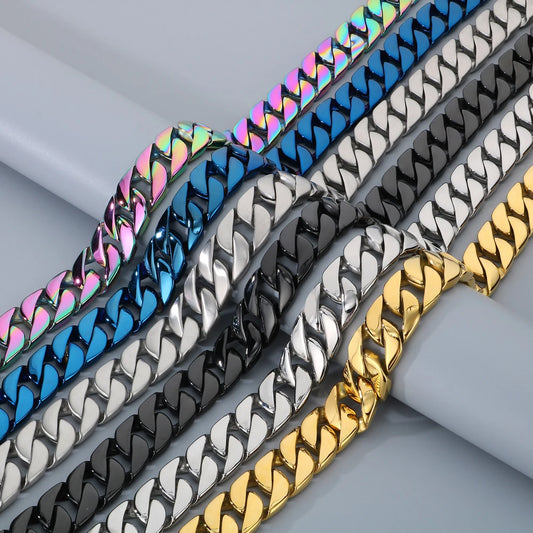Four chain bracelets in different colors on a light gray background