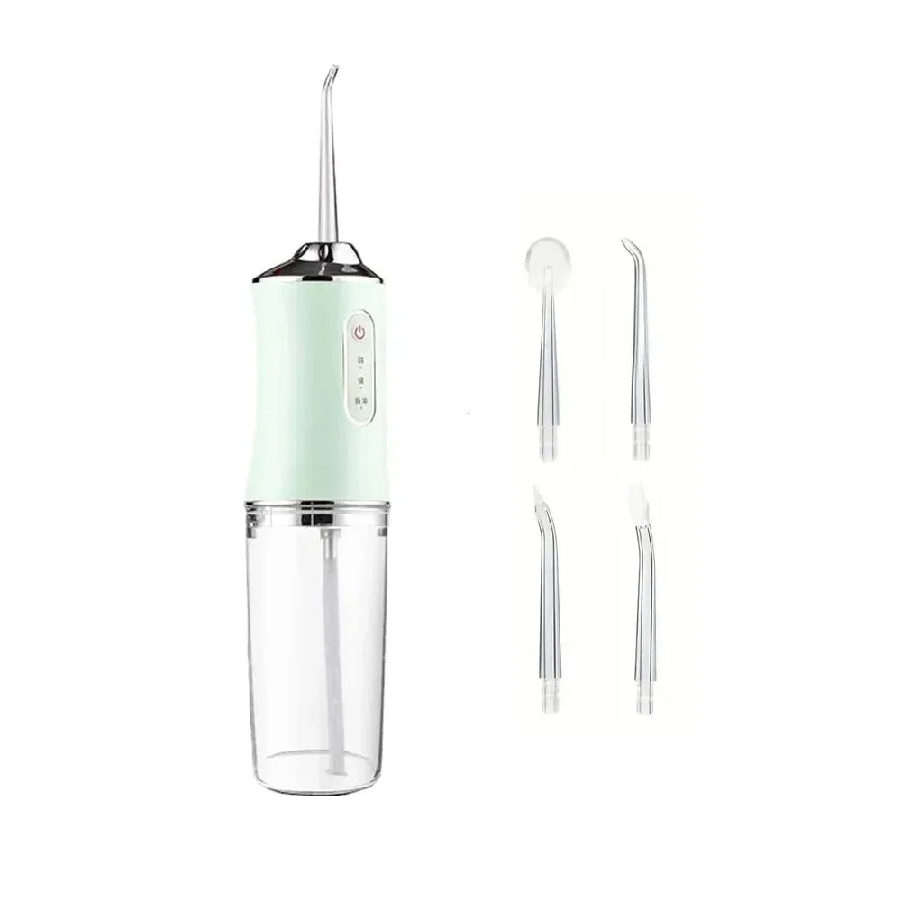 Mint green dental water flosser with clear nozzles on a white background