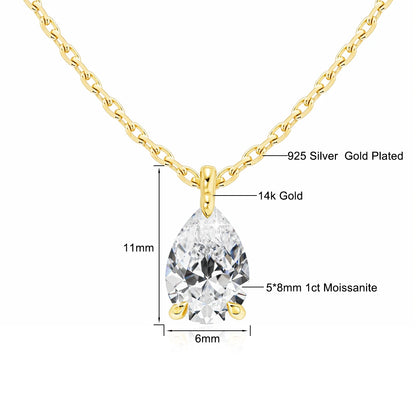 Gold necklace with a teardrop-shaped gemstone, showing material details and dimensions.