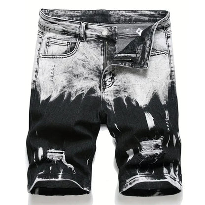 Black and white distressed denim shorts on a white background