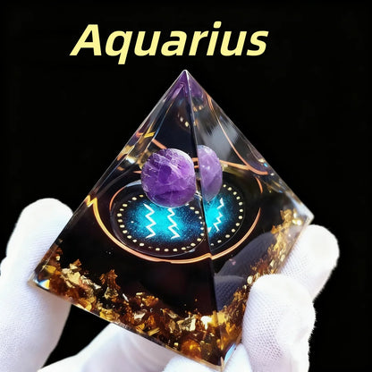 Pyramid-shaped crystal with glowing elements and 'Aquarius' text on a black background