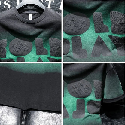 Green and black t-shirt with 'DASPI' branding on a hanger.