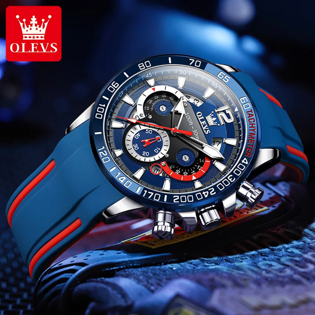 Blue and red watch with detailed face on a dark background, featuring the OLEVS brand.