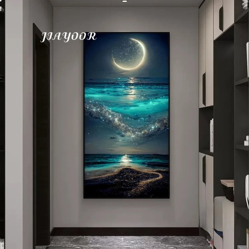 Framed artwork of a celestial scene with a crescent moon over water, displayed on a wall.