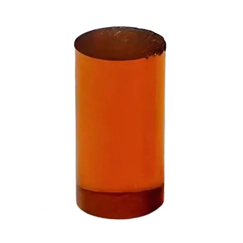 Cylindrical orange object on a white background