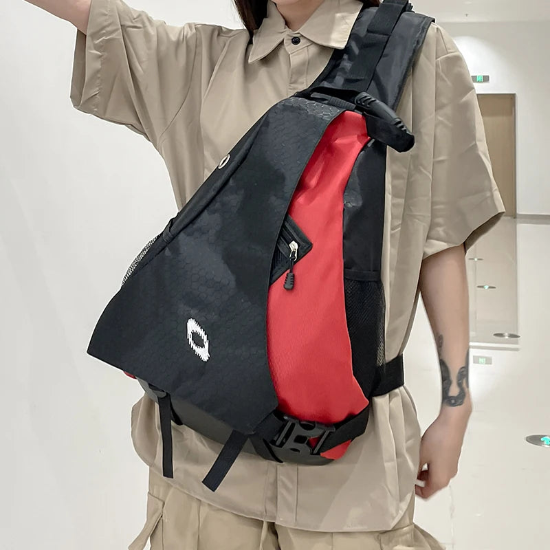 Person wearing a black and red backpack indoors