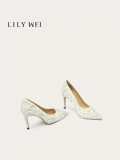White lace high heels on a white background with 'LILY WEI' branding.