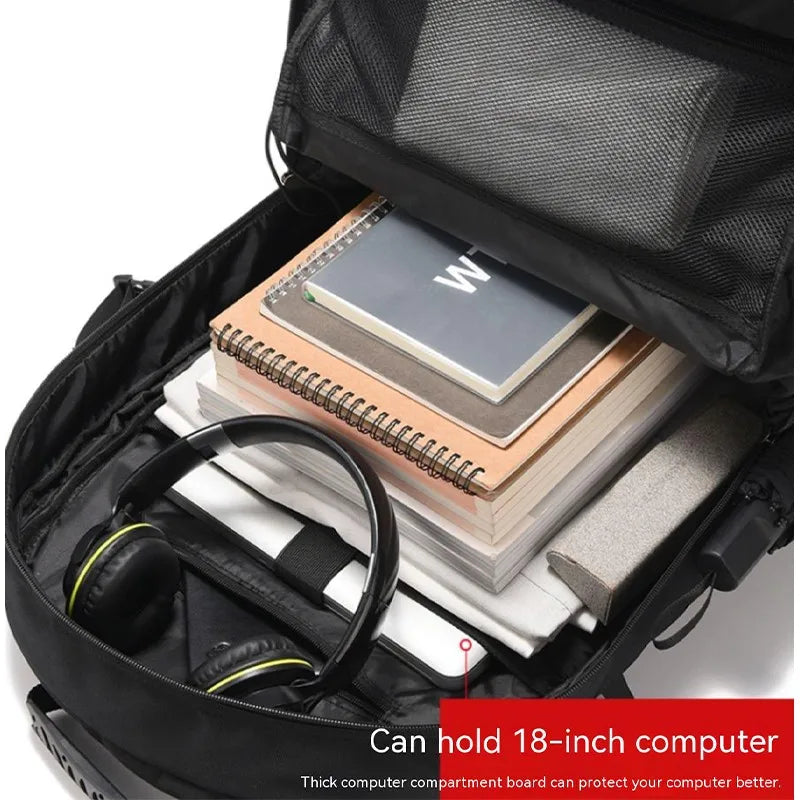 Black backpack with compartments for books, a notebook, and headphones on a white background.