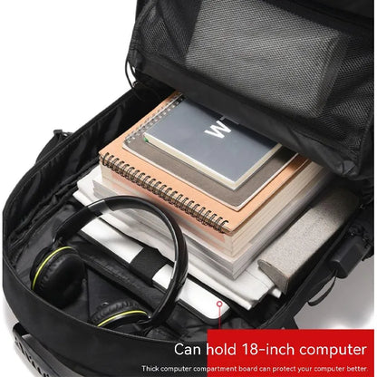 Black backpack with compartments for books, a notebook, and headphones on a white background.