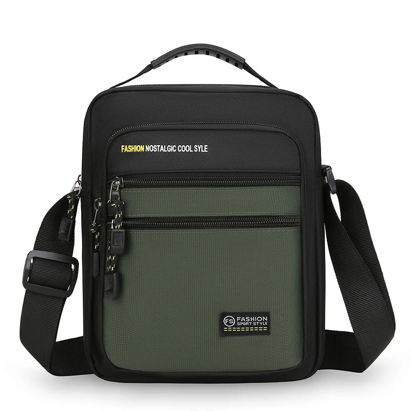 Green crossbody bag with black straps on a white background