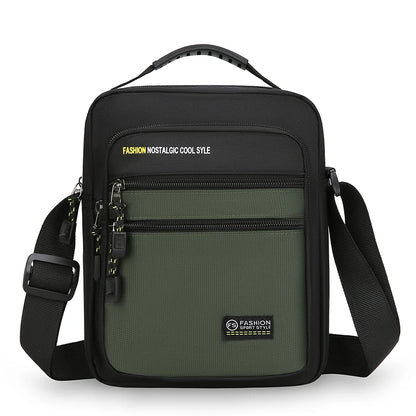 Green crossbody bag with black straps on a white background