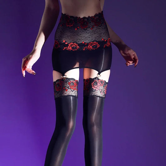 Person wearing black lace top and tights on a purple background
