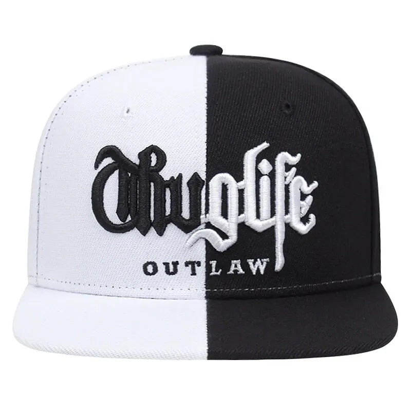 Black and white cap with ' outlaw' text on a white background