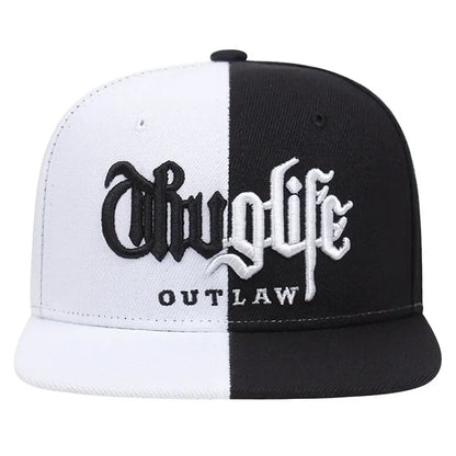 Black and white cap with ' outlaw' text on a white background