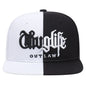 Black and white cap with ' outlaw' text on a white background