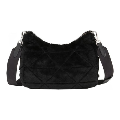 Black quilted handbag with fur-like interior on a white background