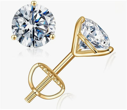 Gold stud earrings with clear gemstones on a white background