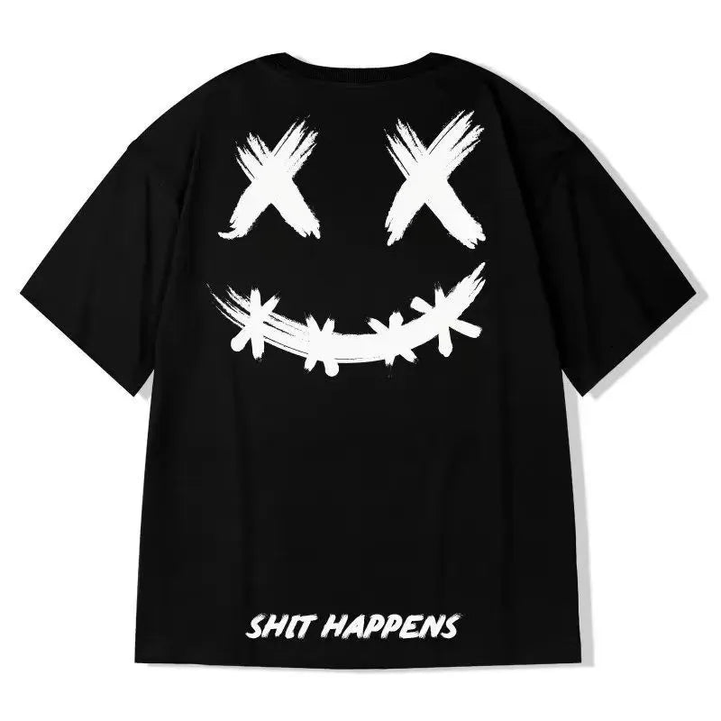 Black t-shirt with white smiley face and 'SHIT HAPPENS' text on a white background