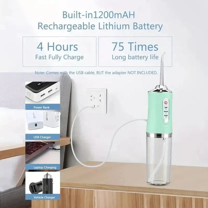 Teal dental water flosser with charging cable on a wooden surface, power bank, and adapter packaging.