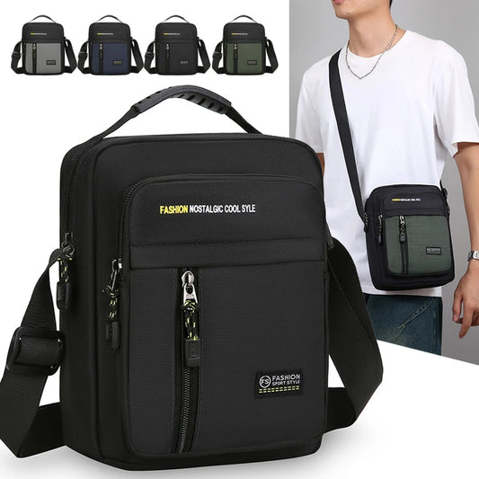 Black shoulder bag with visible brand name, shown with a person wearing a smaller green bag.