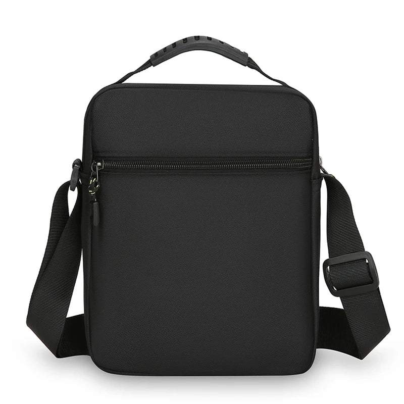 Black shoulder bag with a strap on a white background