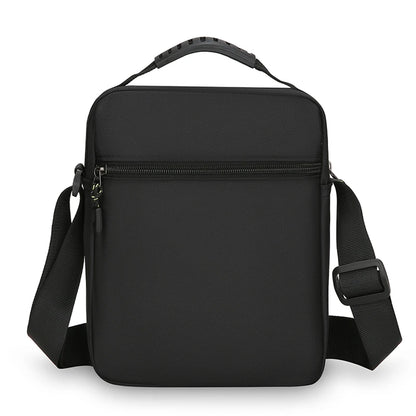 Black shoulder bag with a strap on a white background