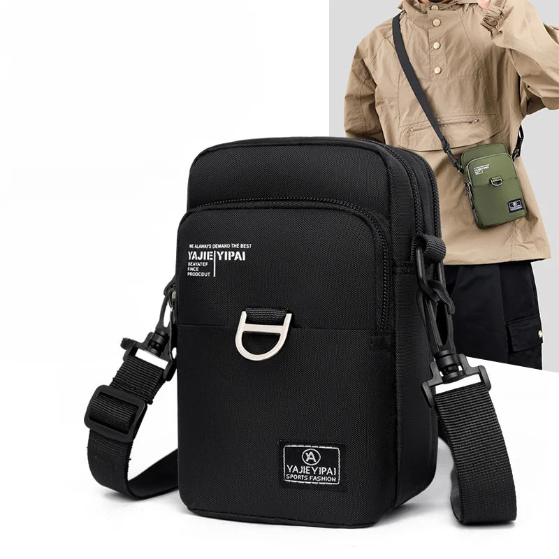 Black crossbody bag with visible brand logo on a white background