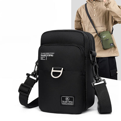 Black crossbody bag with visible brand logo on a white background