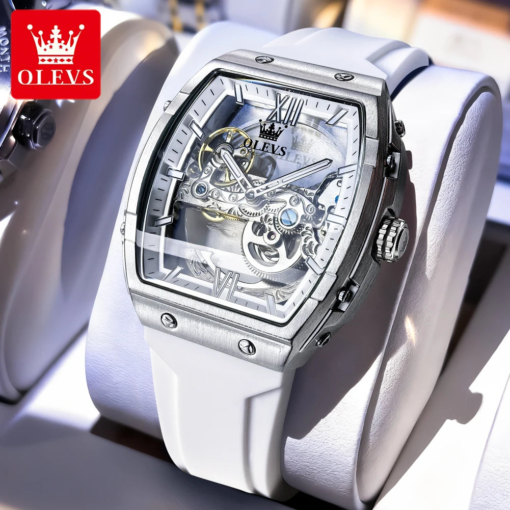 White OLEVS watch with transparent face and visible mechanical components on a white background