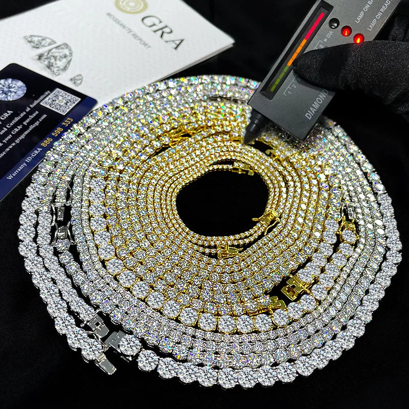 Gold and silver chain with diamond measurement tool on a black background