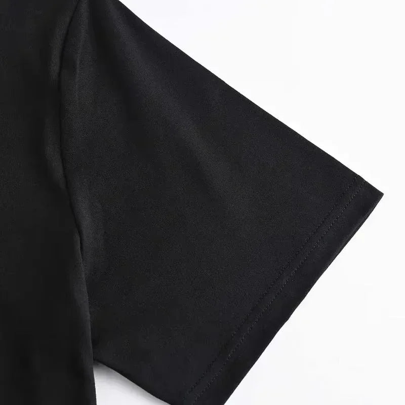 Close-up of a black fabric texture on a white background