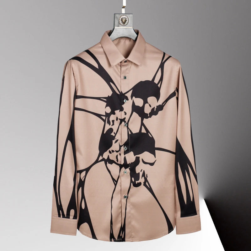 Beige shirt with black abstract design on a gray background