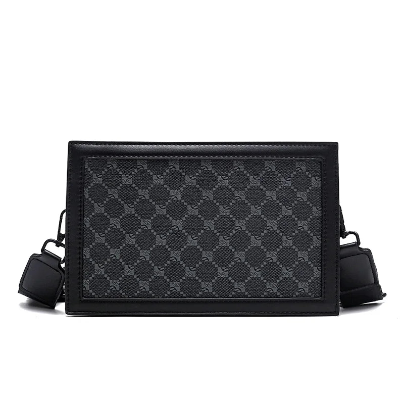 Black patterned crossbody bag on a white background