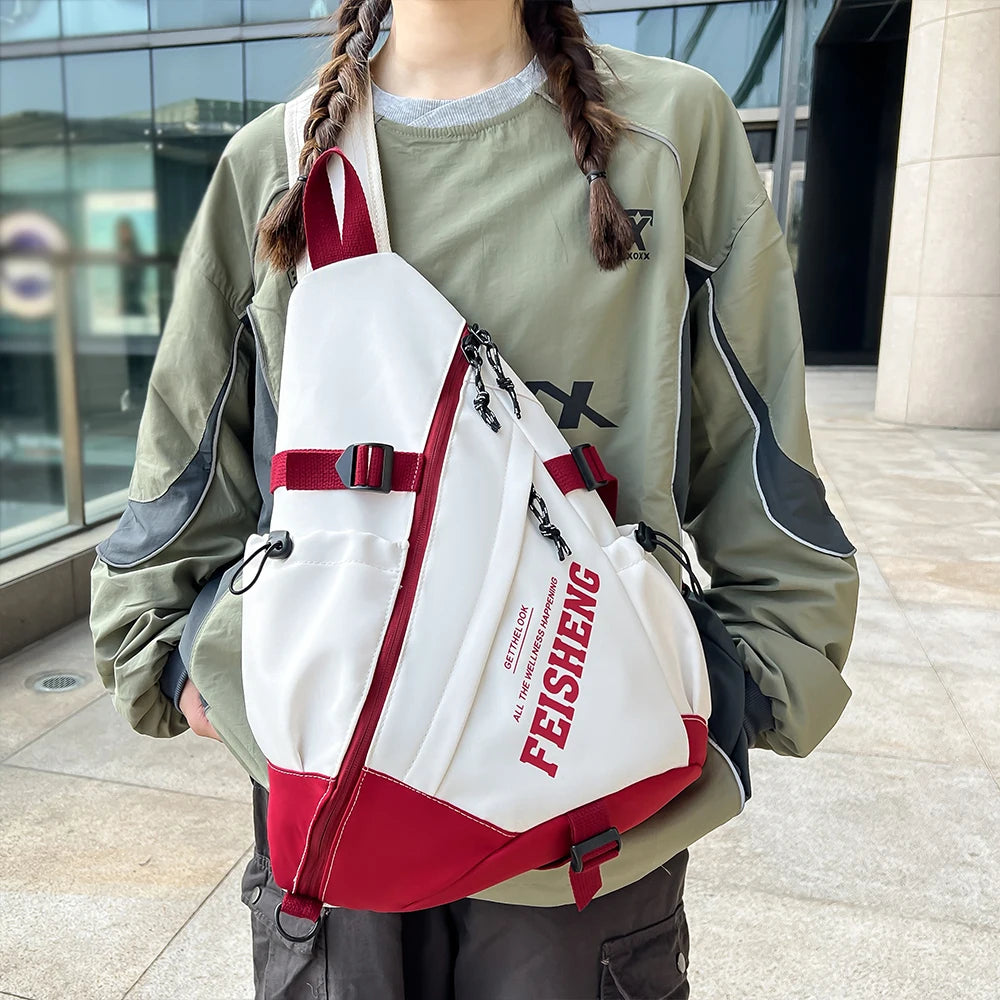 Person wearing a green jacket with a white and red backpack featuring 'FEISIENG' branding.