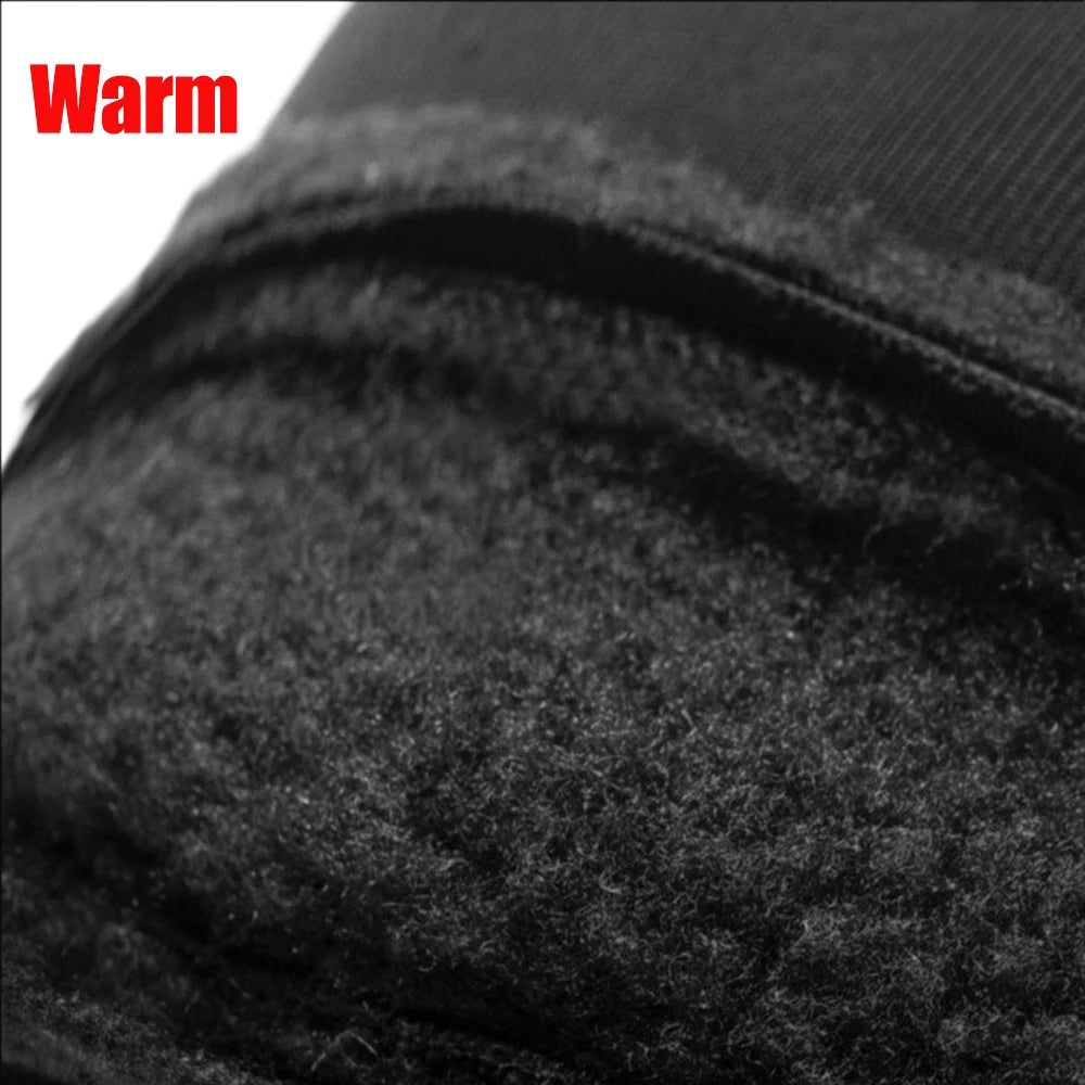 Close-up of black fabric with 'Warm' label in red text.