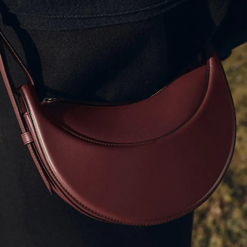 2025 French fashion genuine leather women's shoulder bag, crescent bag, niche design zipper closure shoulder crossbody bag