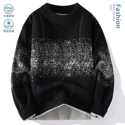 Black and gray patterned sweater on a white background