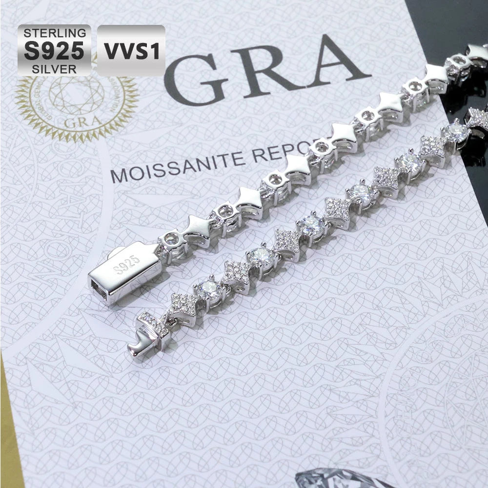 Silver bracelet with gemstones on a branded paper background