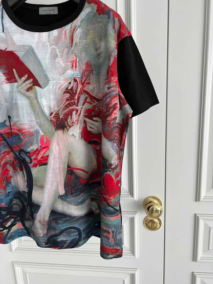 T-shirt with artistic design of a nude figure holding a book against a white door.