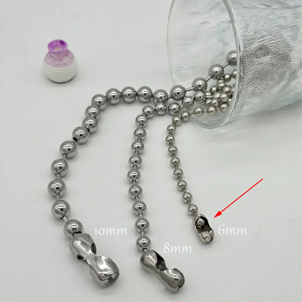 Metallic beaded chain with measurements on a white background