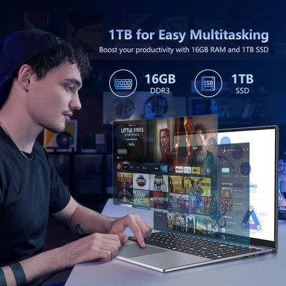 Man using a laptop with 16GB RAM and 1TB SSD highlighted, in a dark room setting.