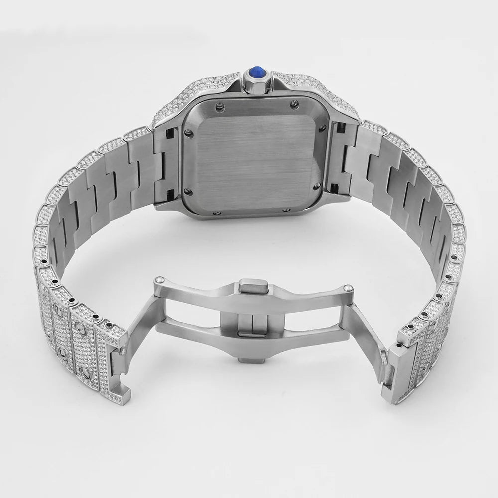 Luxury watch with diamond-studded band on a white background