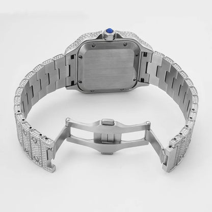Luxury watch with diamond-studded band on a white background