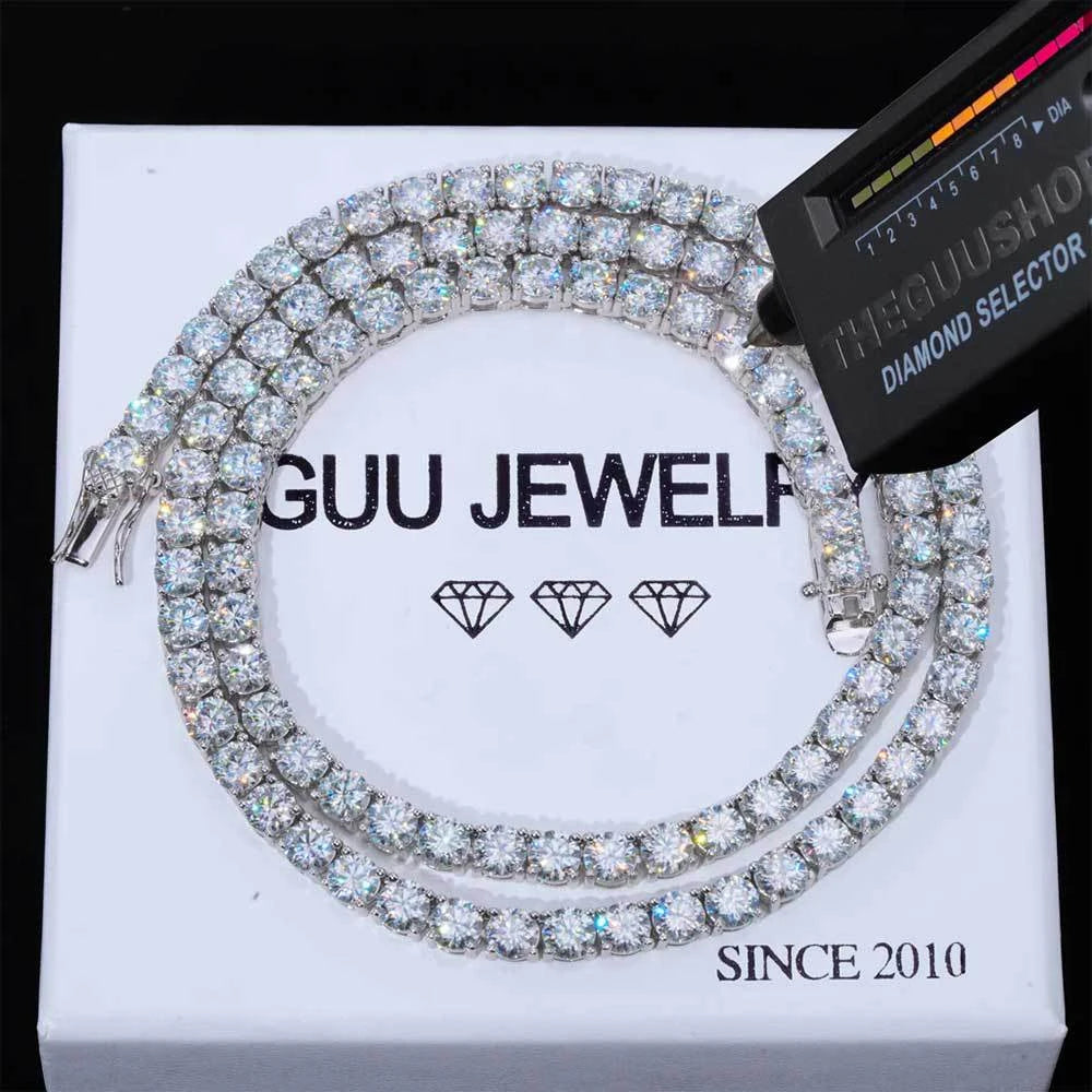 Diamond necklace on a GUU JEWELRY branded stand with a diamond selector tool.
