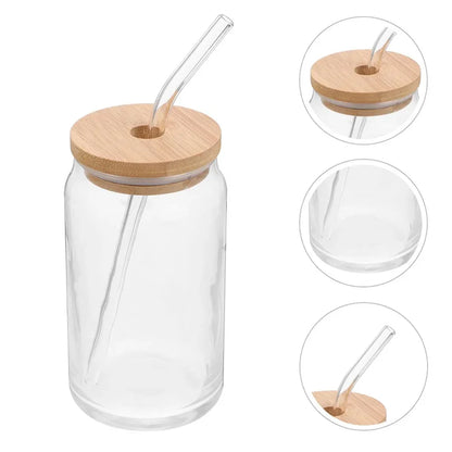 Clear glass jar with wooden lid and straw on a white background
